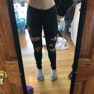 Black distressed skinny jeans